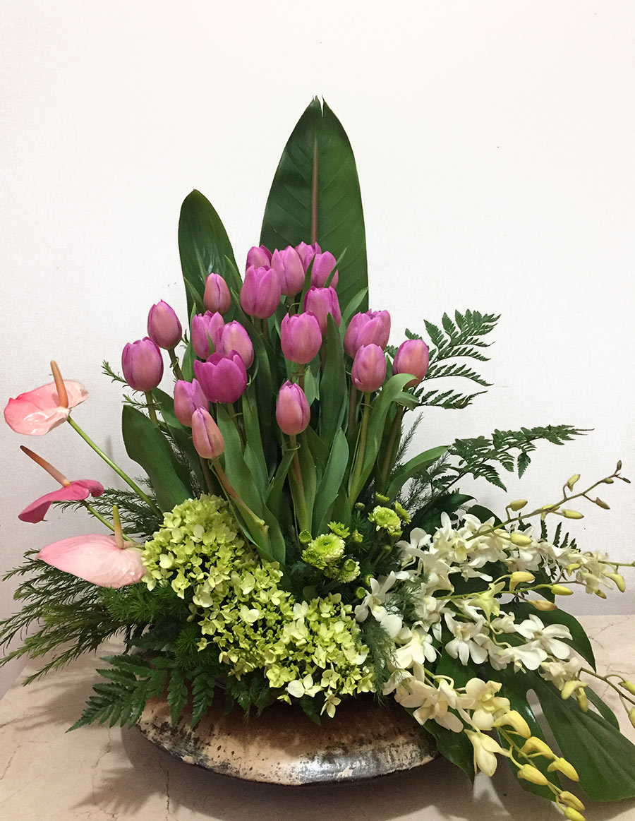 Nido de tulipanes y orquideas | Maria Orsini